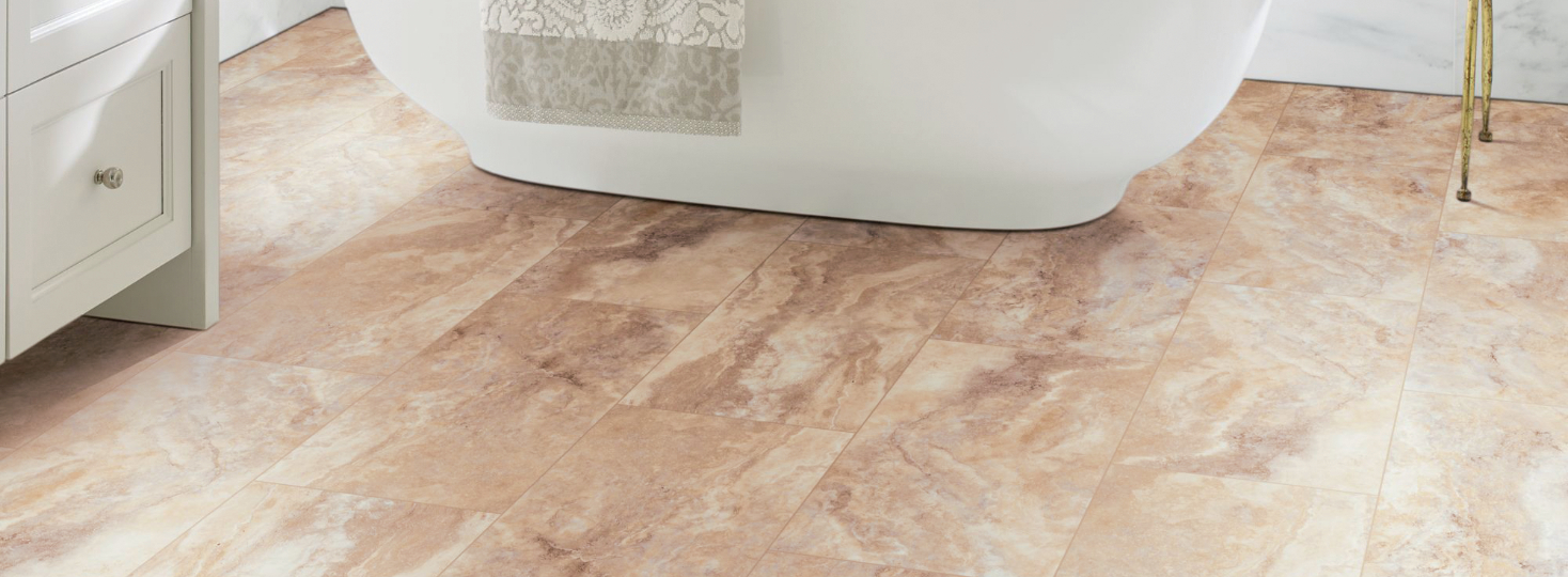 Bathroom Tile Flooring in Bathroom with white soaking tub